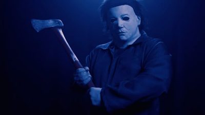 Michael Myers in his mask holding an axe, from Halloween: The Curse of Michael Myers.